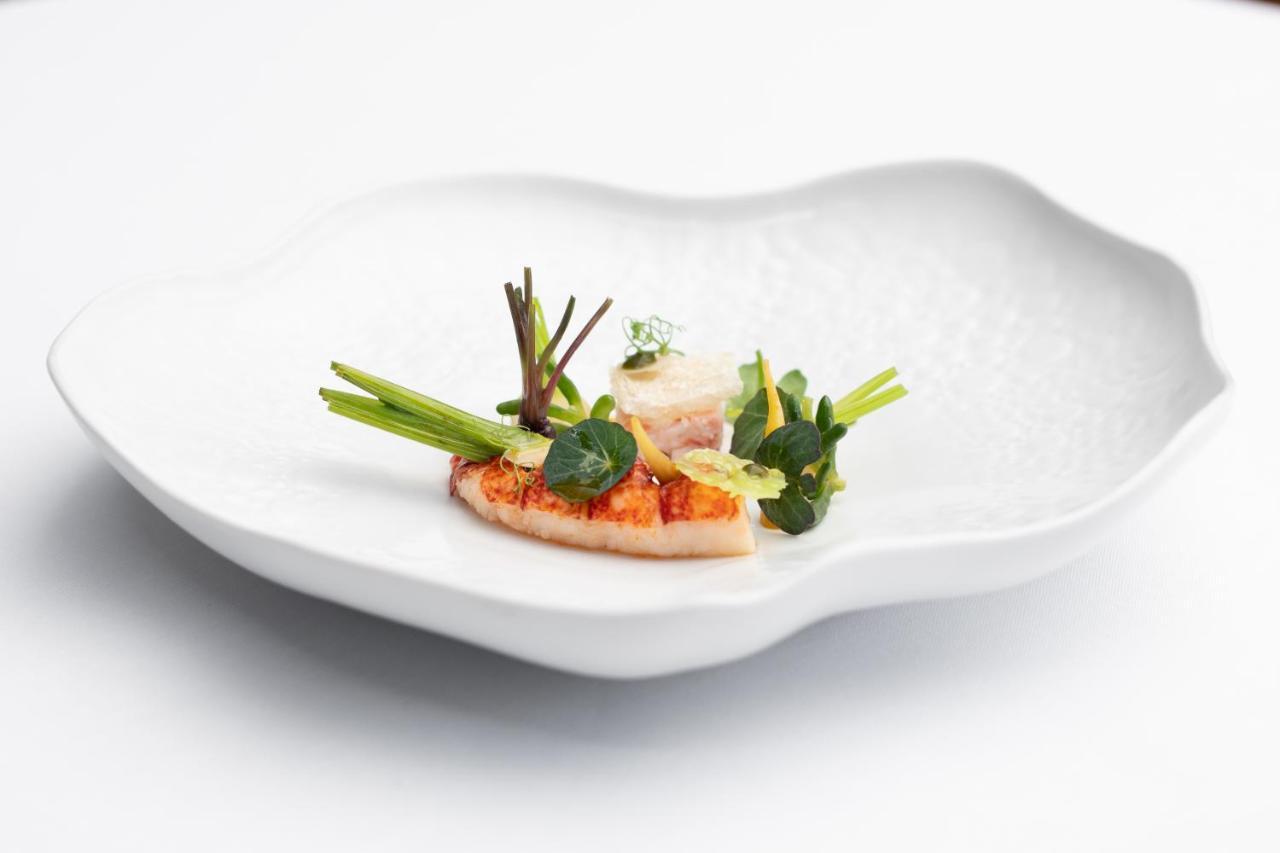 阿尔加维史诗萨纳酒店 阿尔布费拉 外观 照片 A plate of food
