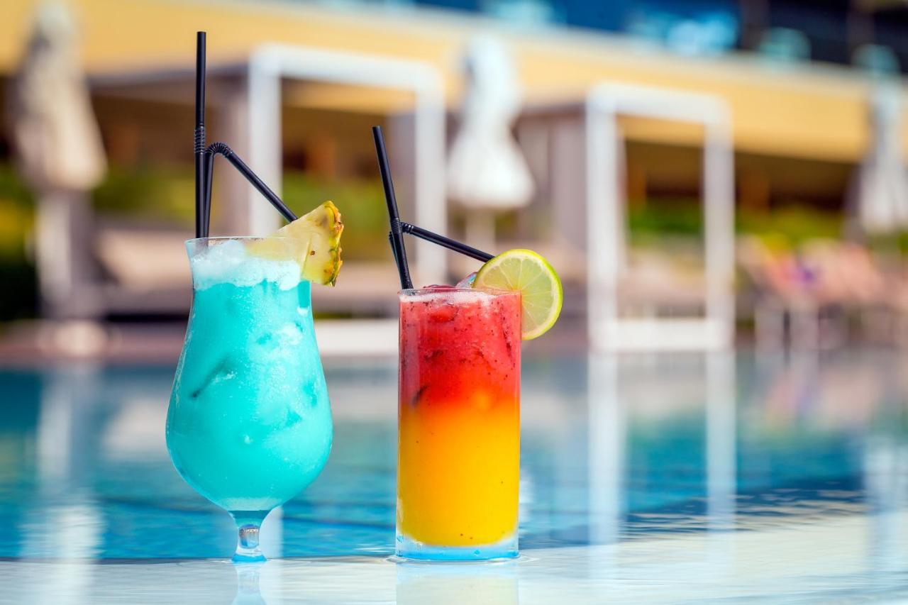 阿尔加维史诗萨纳酒店 阿尔布费拉 外观 照片 Two cocktails